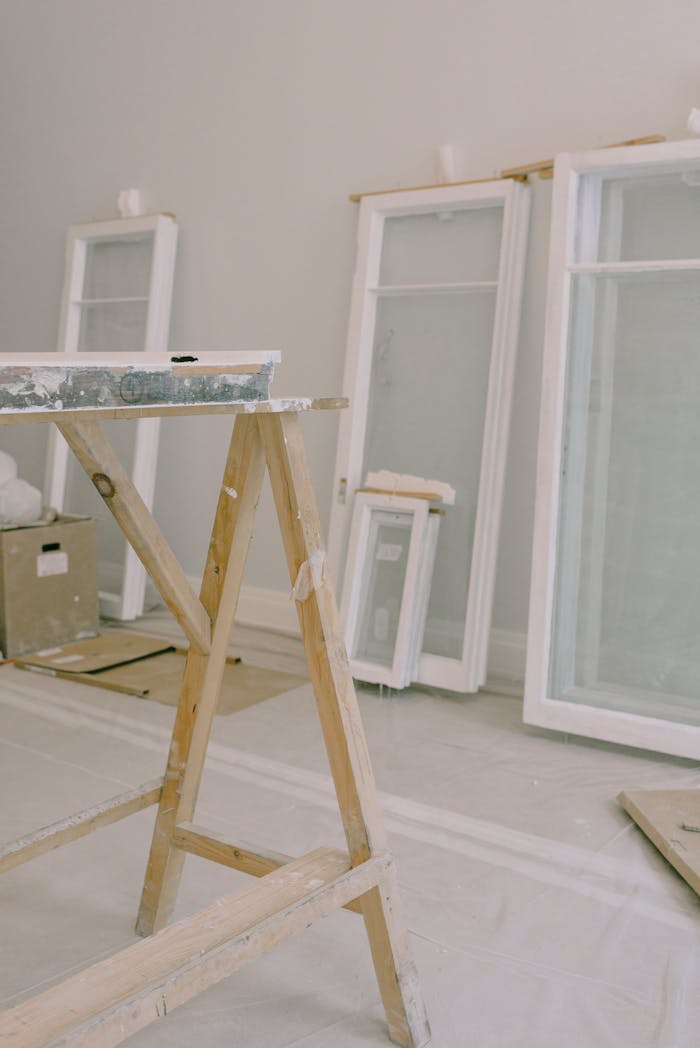 Interior of room under renovation with window frames